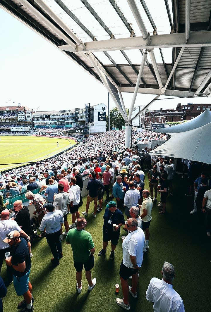Crowds on the pitch-facing terrace at the back of the bowl, The Kia Oval